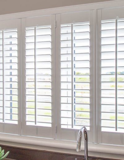 Full Height Shutters in a Beadnell Kitchen from Shutterstyle